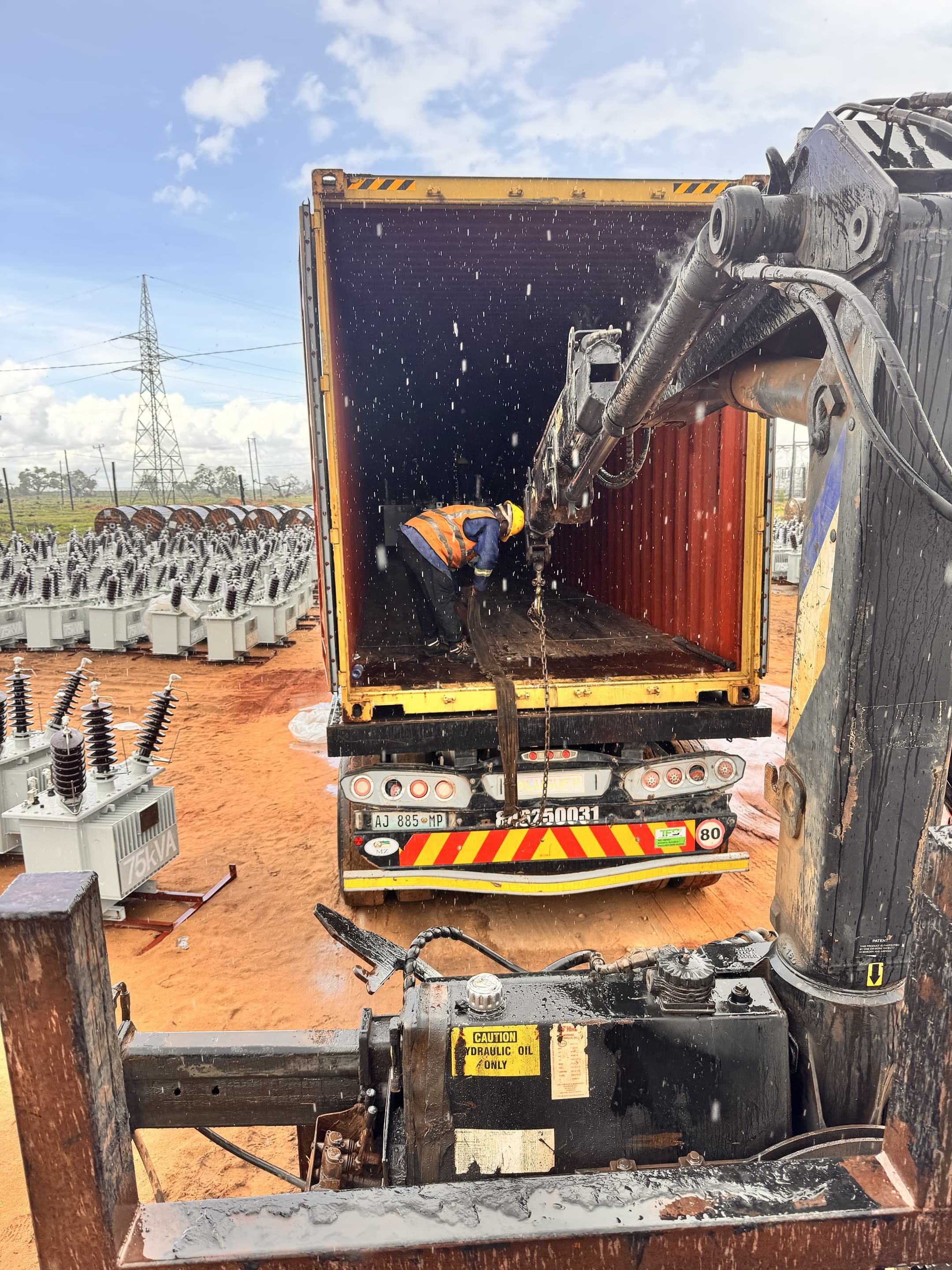 Hydraulic crane operation at destination